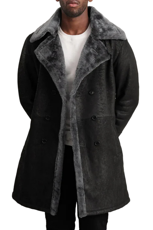 Man wearing a black coat with gray fur collar 