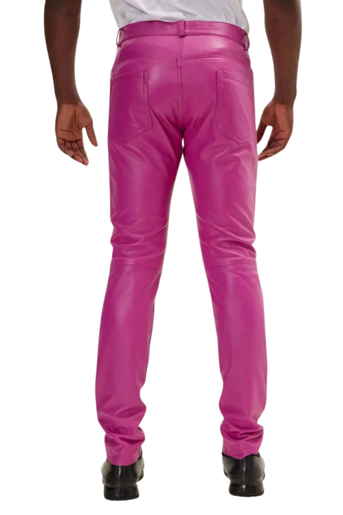 Pink pants worn by a person on a white background