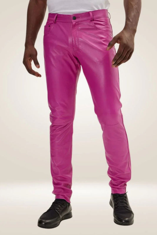 Person wearing bright pink pants on a white background