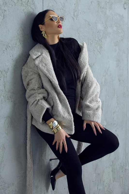 Woman wearing a grey coat 