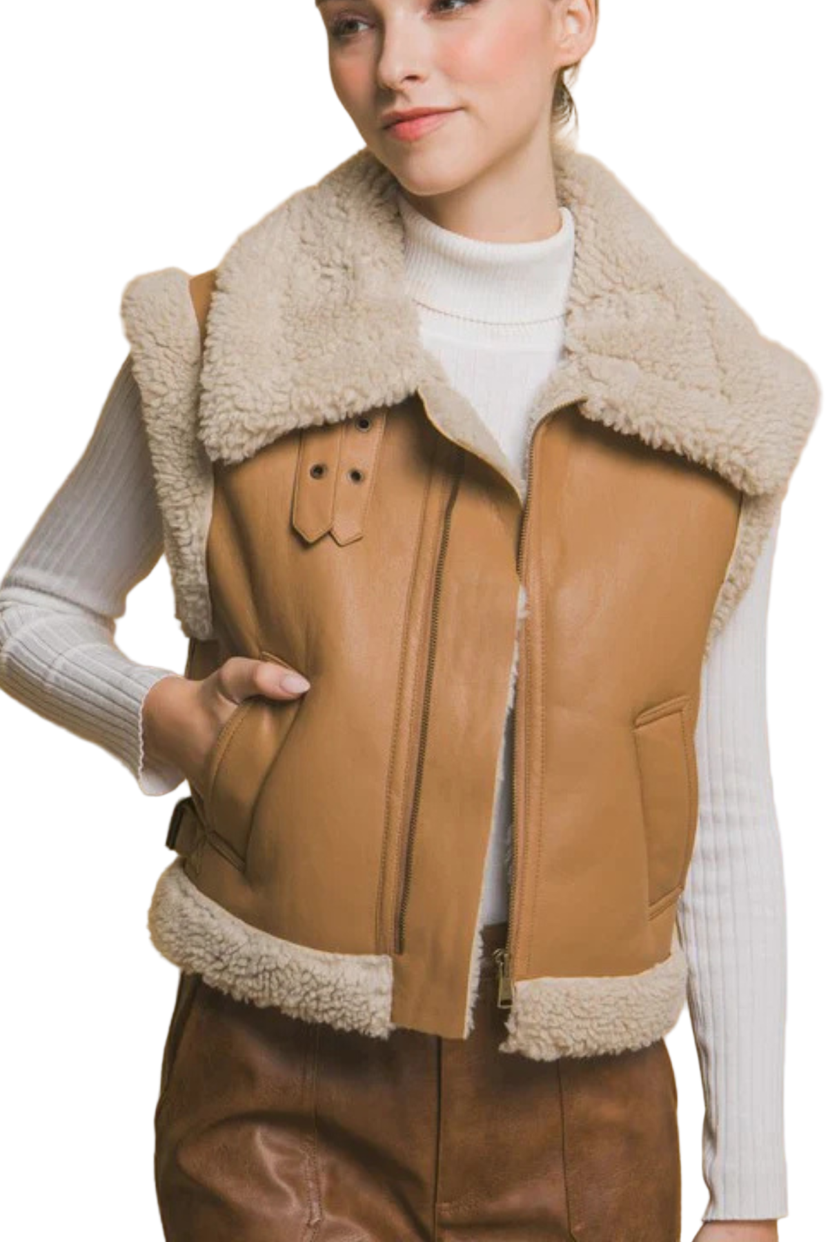 Person wearing a tan leather vest with white fur lining 