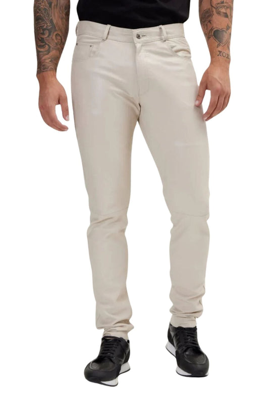 Person wearing beige pants on a white background
