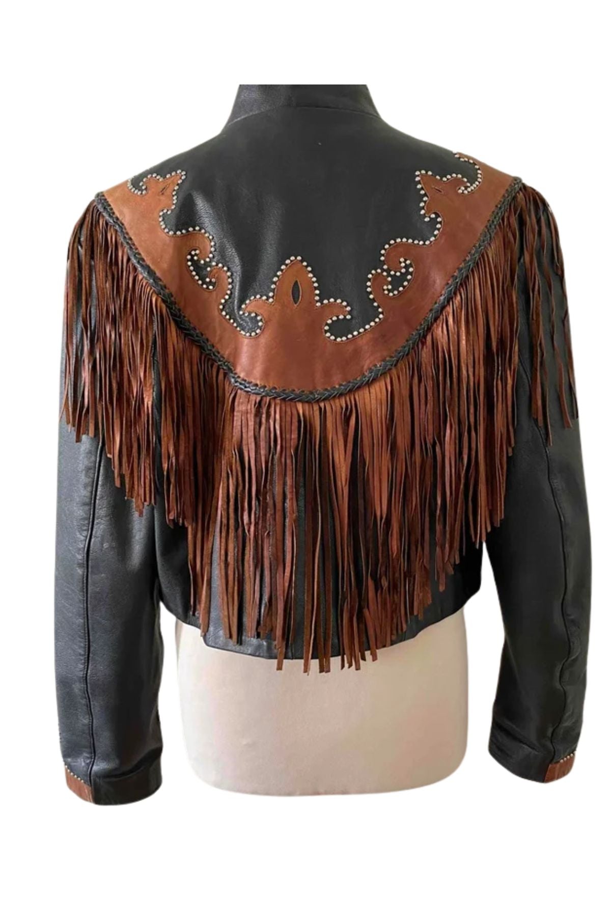 Black leather jacket with brown fringe and decorative back on a mannequin 