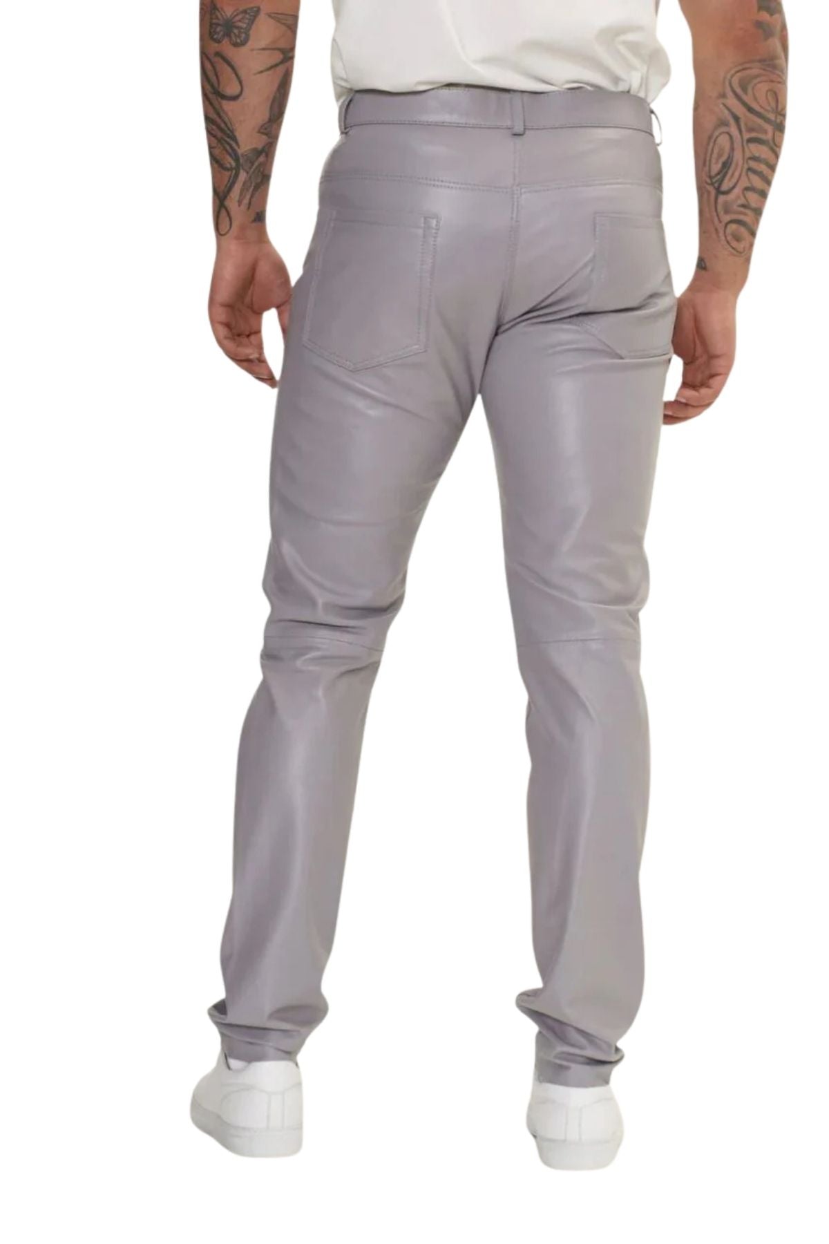 Person wearing light gray pants on a white background