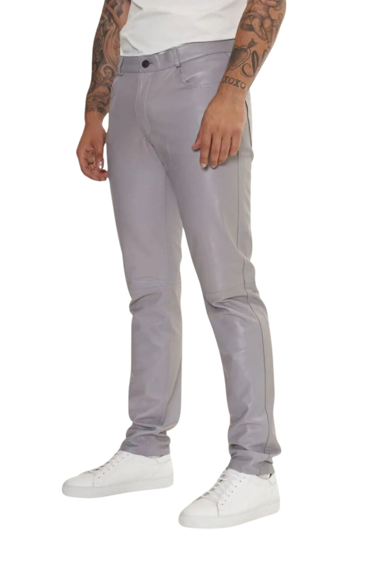 Person wearing light gray jeans on a white background