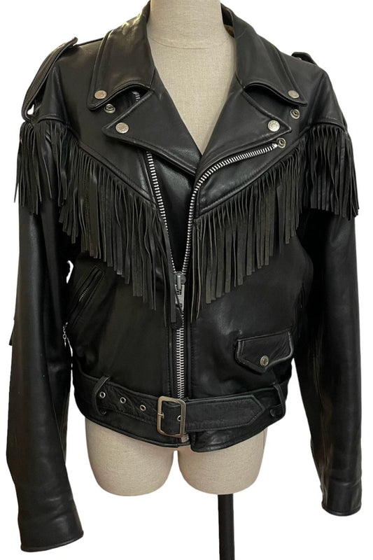 Black leather jacket with fringe details on a mannequin