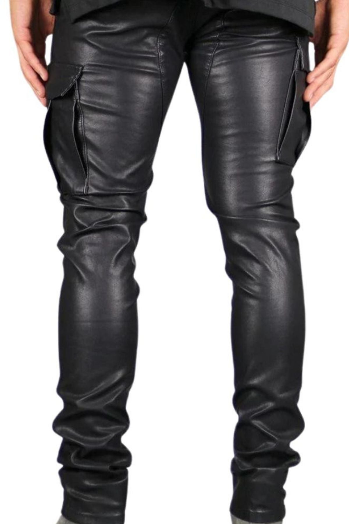 Black leather pants worn by a person on a white background
