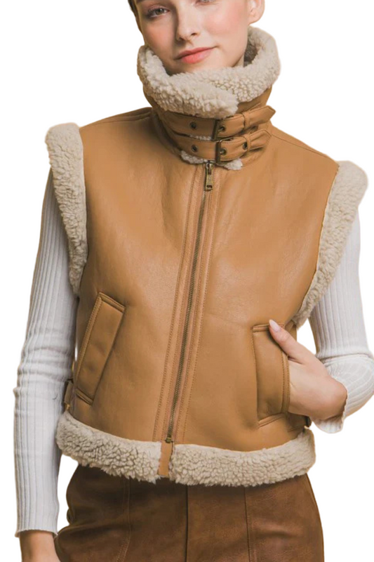  brown leather vest with white fur lining 