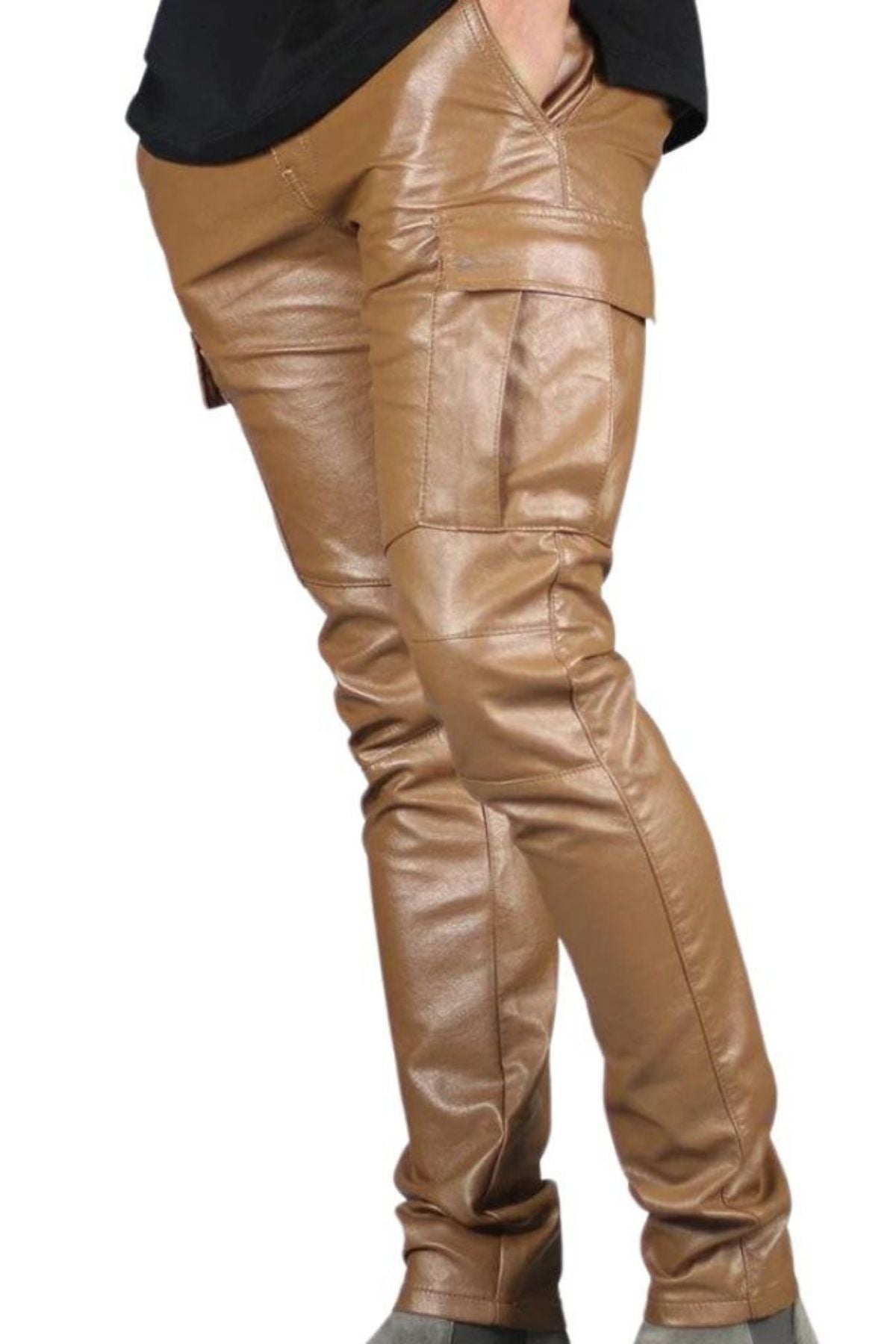 Tan leather pants worn by a person on a white background
