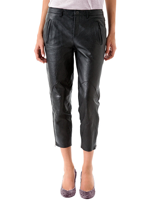 Person wearing black leather pants 
